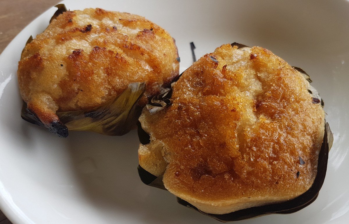 Filipino bibingka rice cake served on a banana leaf