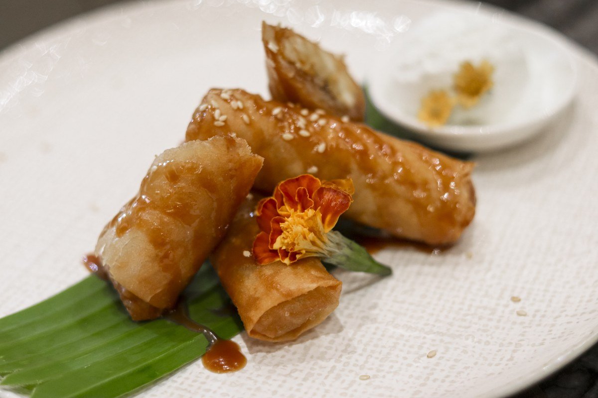 Golden Filipino turon banana rolls served as merienda