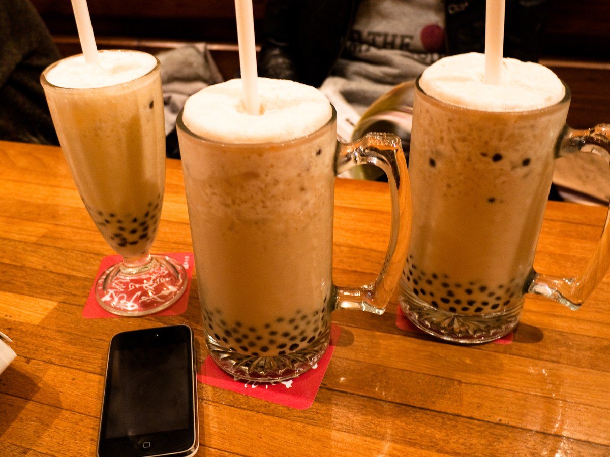 Several cups of bubble tea with different flavours