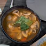Thai tom yum soup featuring spicy and sour Southeast Asian flavours
