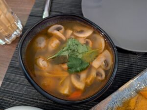 Thai tom yum soup featuring spicy and sour Southeast Asian flavours