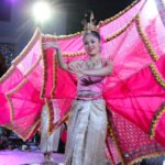 Traditional dancer performing during a khantoke dinner in Chiang Mai