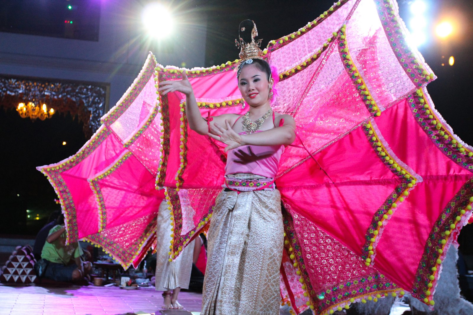 Traditional dancer performing during a khantoke dinner in Chiang Mai