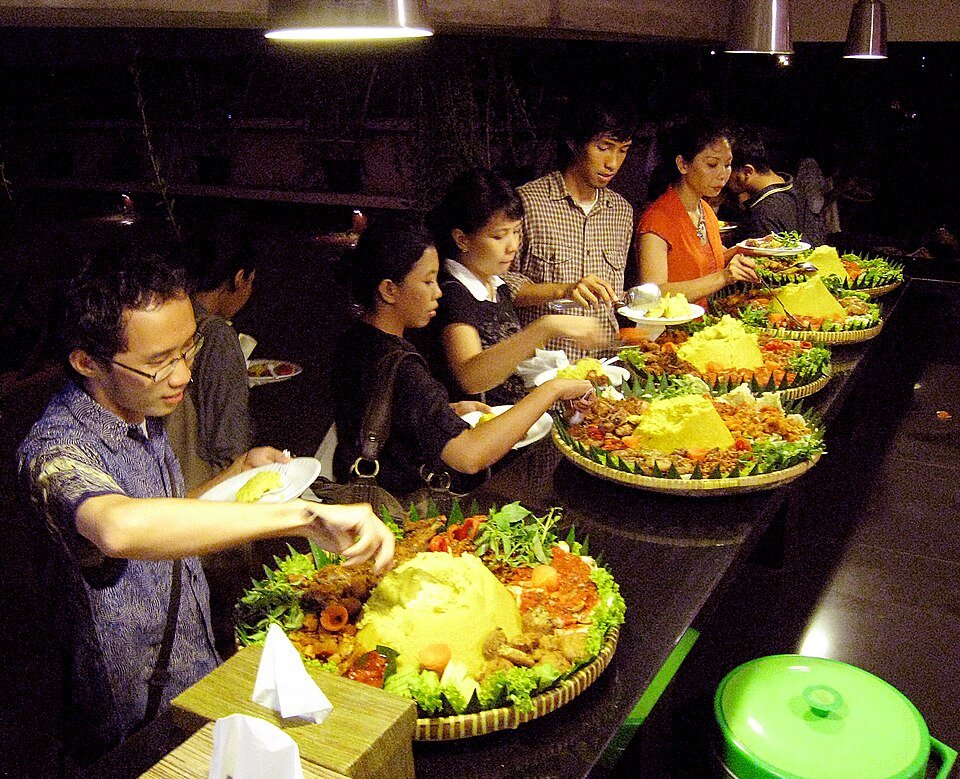 Tumpeng feast displayed at a celebration in Jakarta, Indonesia