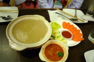Ambuyat and dipping sauces served in Bandar Seri Begawan, Brunei