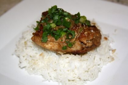 Filipino chicken adobo in a bowl with sauce