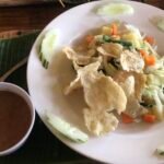 Gado-gado with vegetables, crackers and peanut sauce in Bukit Lawang