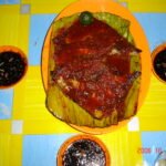 Ikan bakar in a Malaysian meal; the fish species is not identified in the photograph