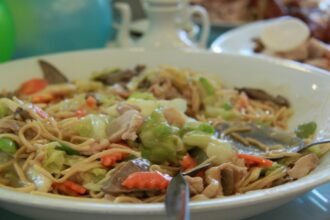 Plate of Filipino pancit canton noodles