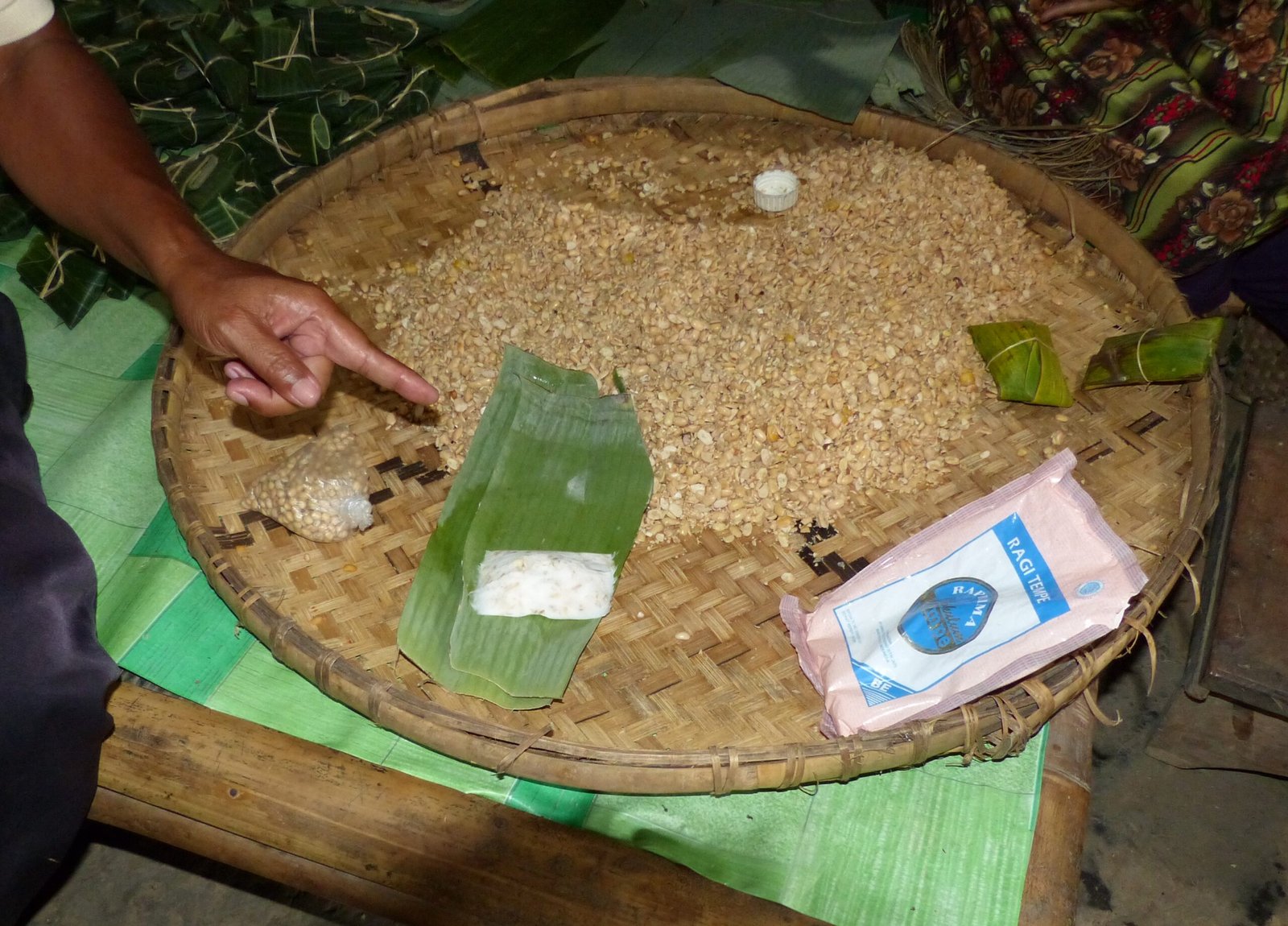 Soybeans and banana leaves laid out for tempe production in a Central Java village