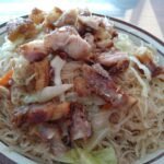 Pancit bihon rice noodles served on a plate