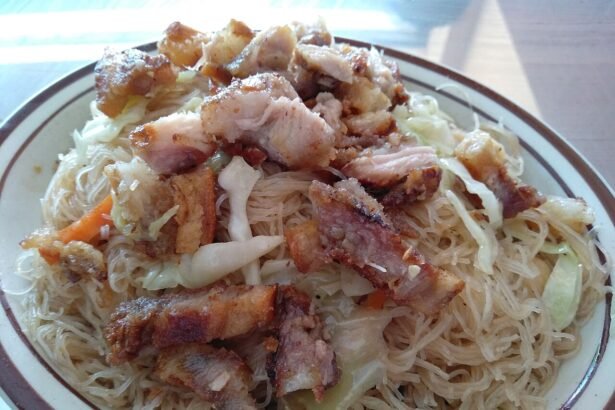 Pancit bihon rice noodles served on a plate