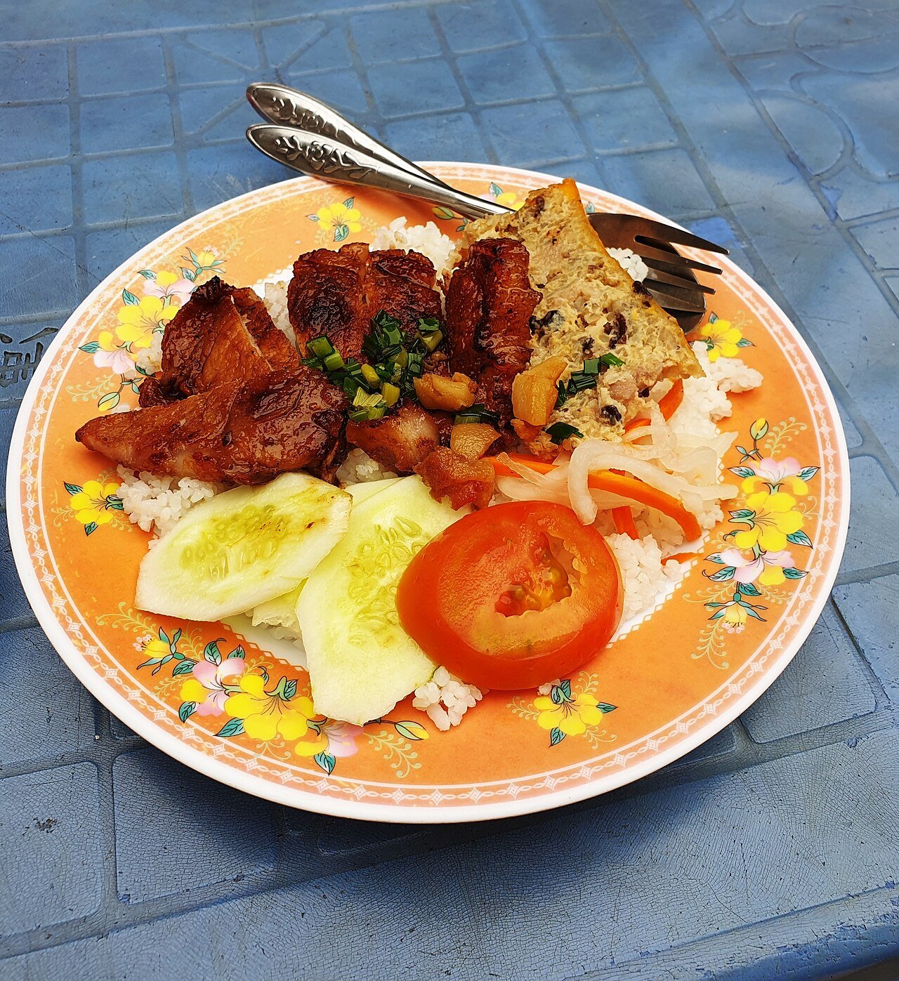 A cơm tấm plate photographed in Ho Chi Minh City