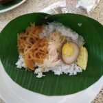 Nasi liwet rice dish with accompaniments from Solo