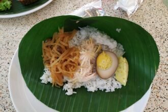 Nasi liwet rice dish with accompaniments from Solo